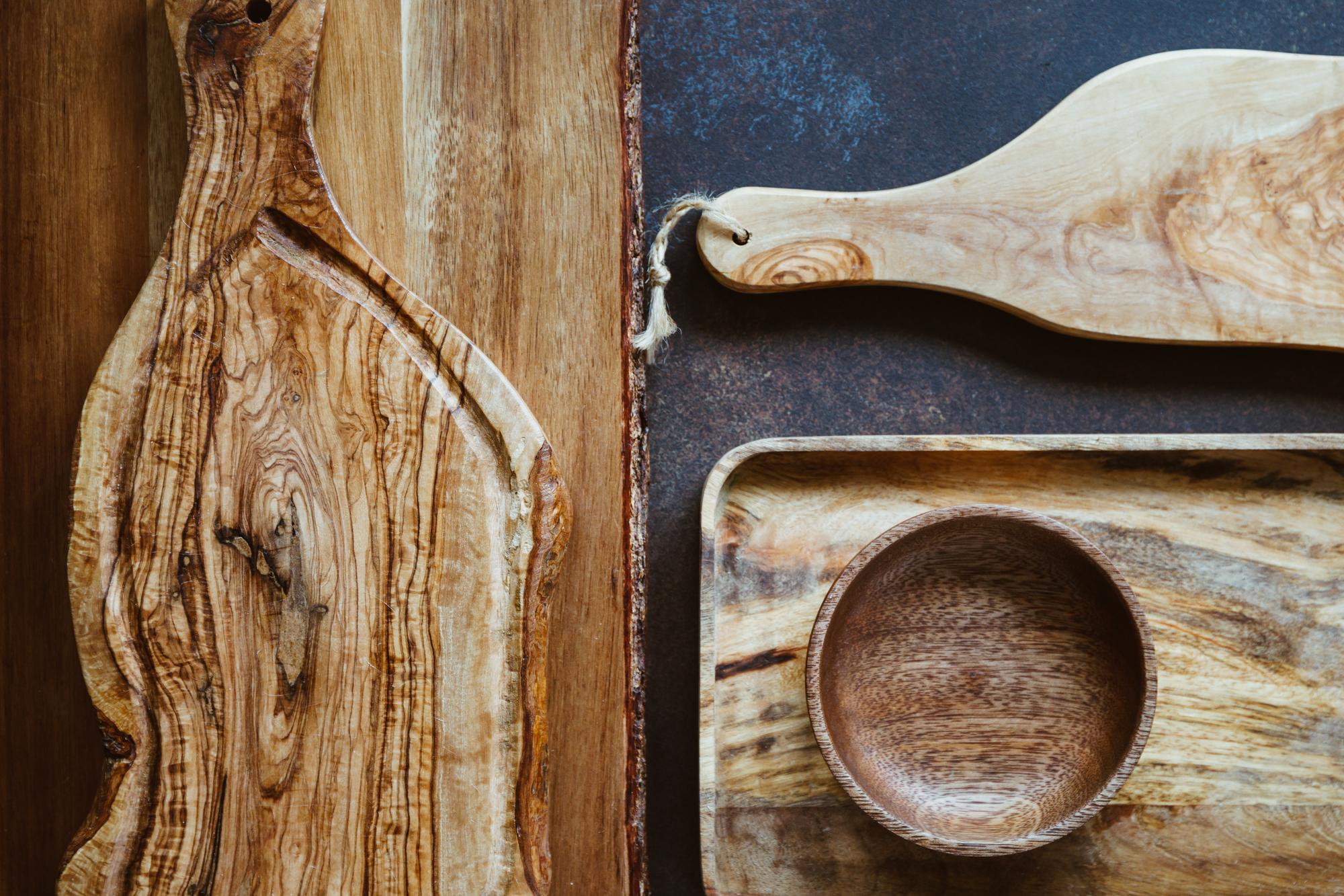 Close-up of artisan tools and wooden board