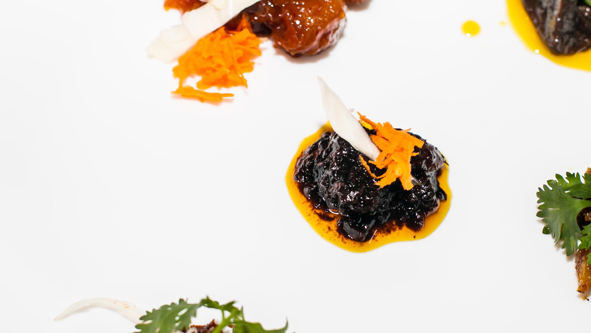 Close-up: charred vegetables and glaze